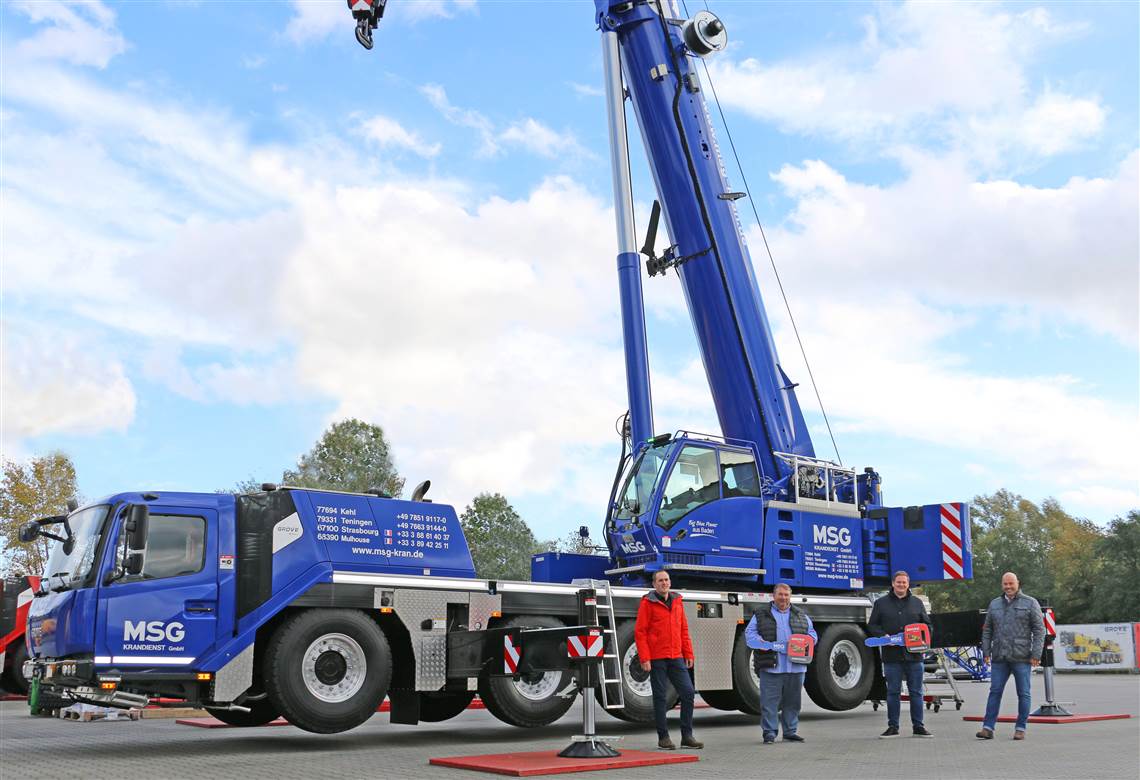 Lukas BrÃ¤mer, sales representative at KranAgentur Werner, the dealer selling the crane; Alfred Jatz, MSG Krandienst partner; BjÃ¶rn Jatz, MSG Krandienst managing director; and Andreas Werner, KranAgentur Werner managing director