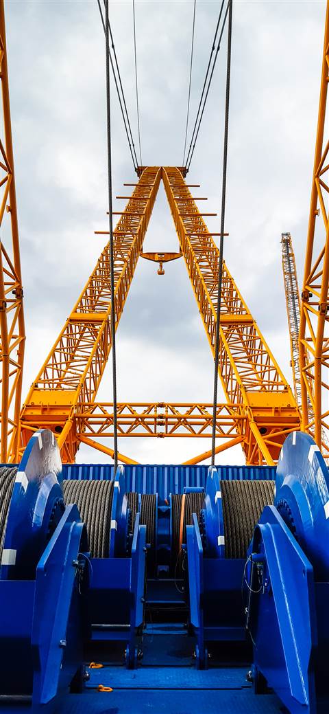 A view of the winches and the twin booms from the rear deck looking forward on the Sarens SGC-90