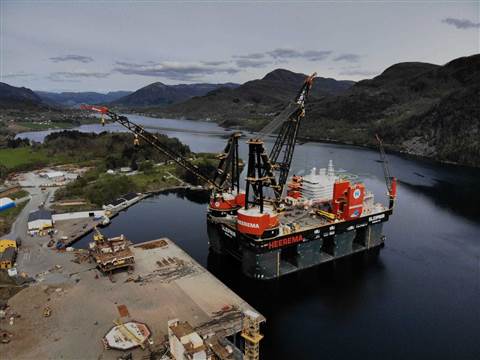 Aerial view of Heerema Marine Contractors decommissioning the platform with Sleipnir heavy lift vessel