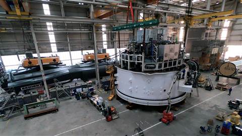 The upper and lower sections of the 3,000 tonne crane are now married, pictured already assembled inside the Rostock factory